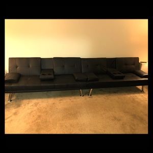 Two black leather futons